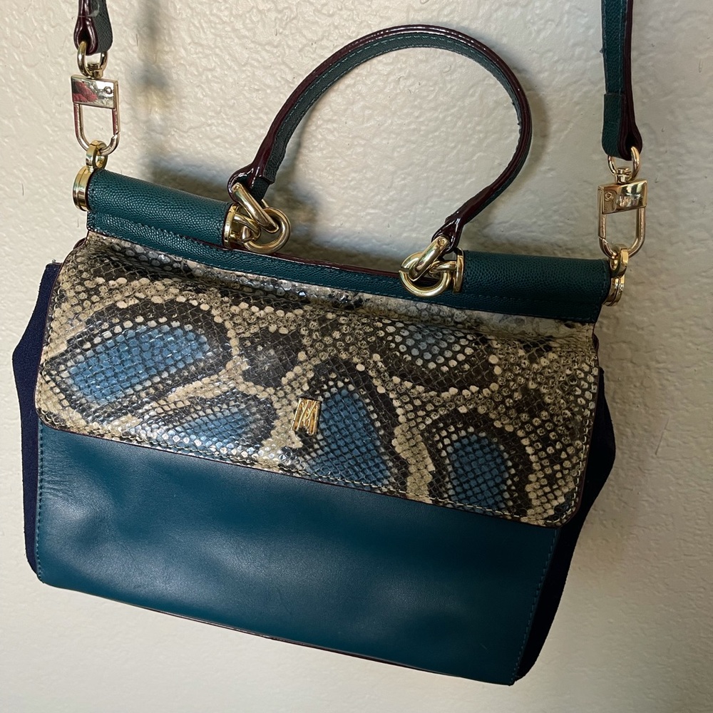 Leather crossbody snap closure
